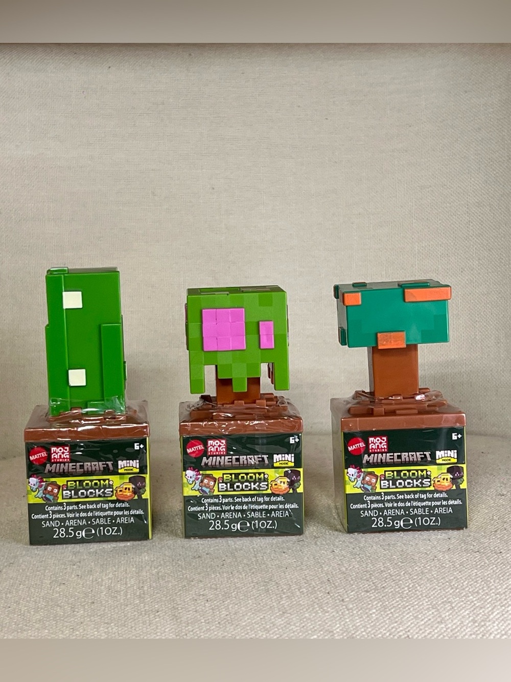 Mattel Minecraft Bloom Blocks Mini Figures in Bright Green, Brown, Teal, Pink